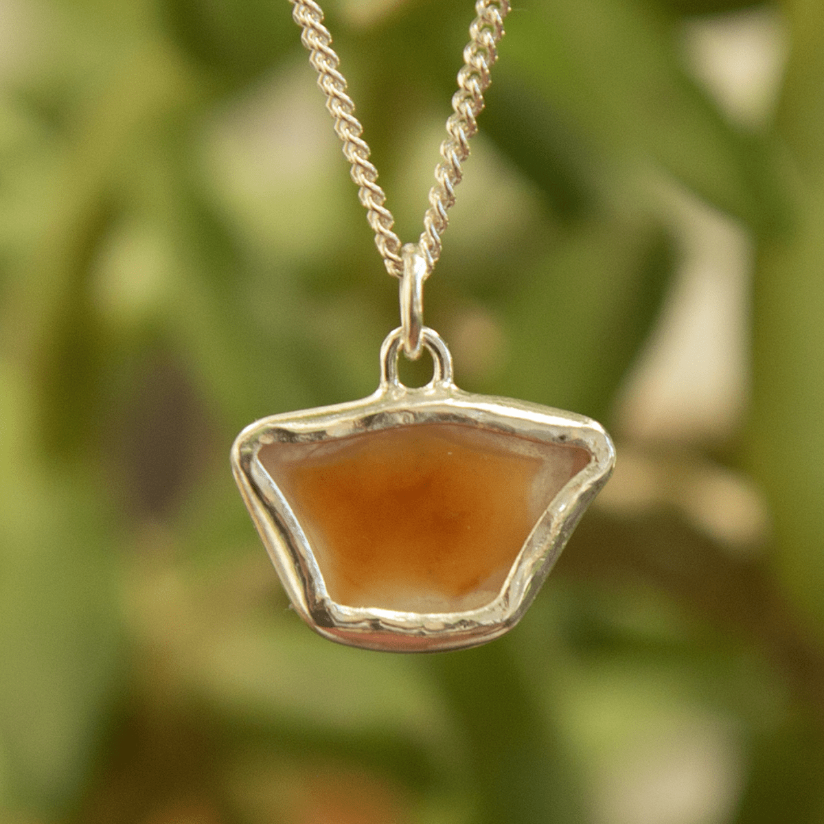 orange carnelian pendant in sterling silver